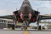 Crew chief performs an inspection on an F-35A Lightning II at Luke Air Force Base